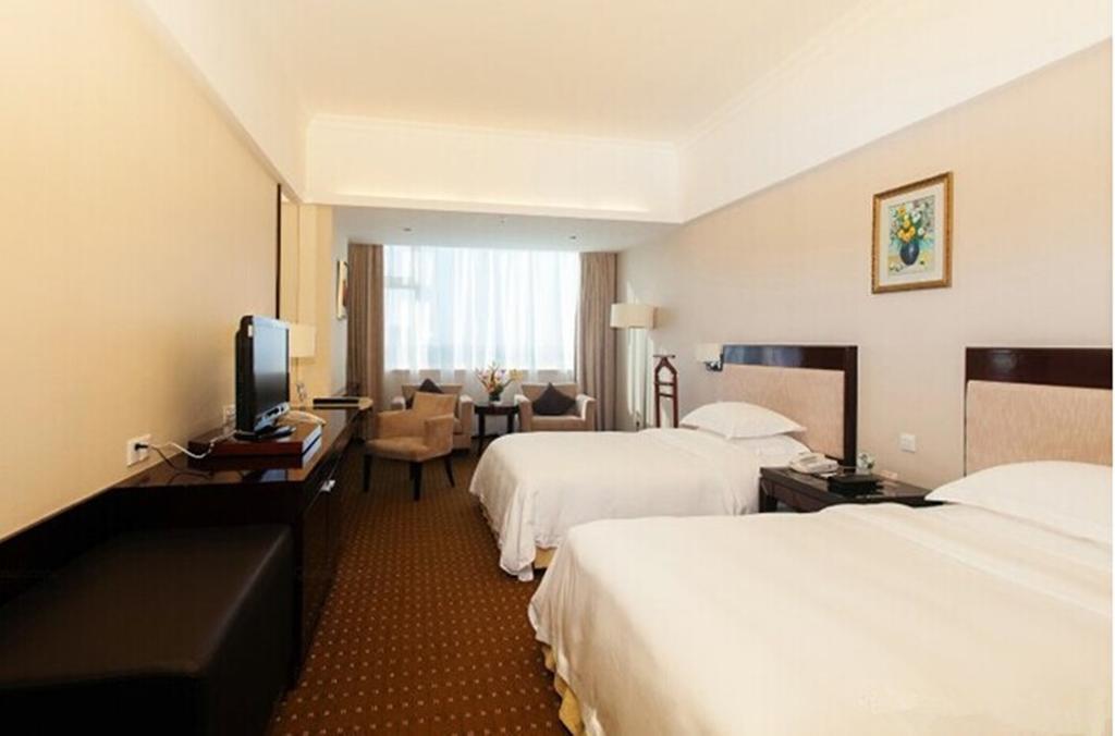 Tienyow Grand Hotel Hajkou Szoba fotó