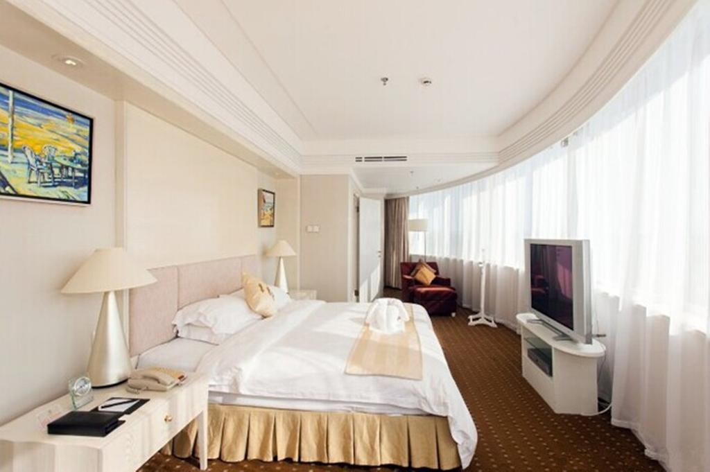 Tienyow Grand Hotel Hajkou Szoba fotó