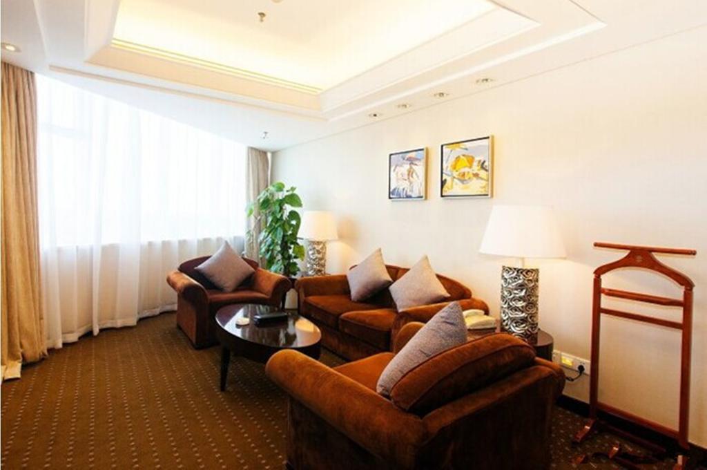 Tienyow Grand Hotel Hajkou Szoba fotó